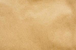 Brown paper eco recycled kraft sheet texture cardboard background photo