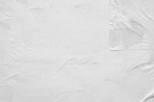 Blank white crumpled and creased paper poster texture background photo