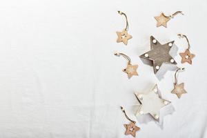 Christmas flatlay decor background on white textile background photo