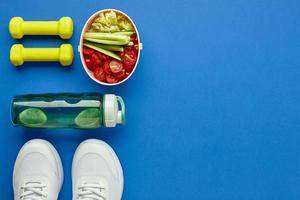 Creative flat lay of sport and fitness equipments. photo