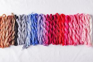Colorful pattern background from embroidery thread photo