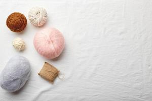 Balls of wool and mohair for knitting in pastel colors photo