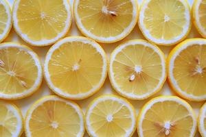 Ripe and fresh lemons close up for background. photo