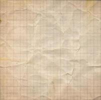 Old wrinkled grid scale paper sheet background photo