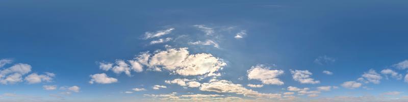 Seamless cloudy blue sky hdri panorama 360 degrees angle view with zenith and beautiful clouds for use in 3d graphics as sky dome or edit drone shot photo