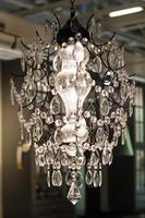 Chrystal chandelier with lights on photo