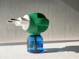 electric fumigator. fumigation indoors. repellent, mosquito repellent photo