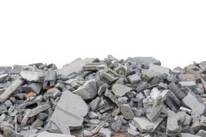 Pile of broken concrete blocks in construction site isolated on white background included clipping path. photo