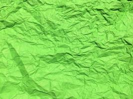 Minimal green crumpled paper texture background for Design. Copy space for text or work photo