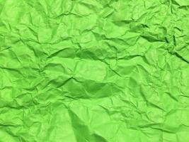 Minimal green crumpled paper texture background for Design. Copy space for text or work photo