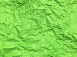 Minimal green crumpled paper texture background for Design. Copy space for text or work photo
