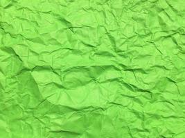 Minimal green crumpled paper texture background for Design. Copy space for text or work photo