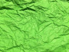 Minimal green crumpled paper texture background for Design. Copy space for text or work photo