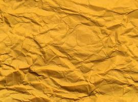 Yellow wrinkled paper background for Design. Copy space for text or work photo