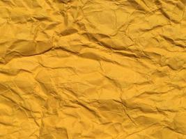 Yellow wrinkled paper background for Design. Copy space for text or work photo