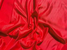 Red fabric texture for backgroundwith coy space. Valentines Day or Christmas Day wallpaper design photo