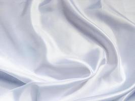 Solf white satin fabric texture background. use as wedding or aniversary day with copy space for design photo