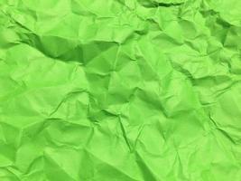 Minimal green crumpled paper texture background for Design. Copy space for text or work photo