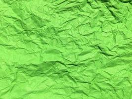 Minimal green crumpled paper texture background for Design. Copy space for text or work photo