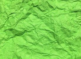 Minimal green crumpled paper texture background for Design. Copy space for text or work photo