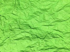 Minimal green crumpled paper texture background for Design. Copy space for text or work photo