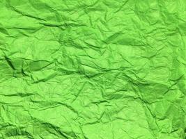 Minimal green crumpled paper texture background for Design. Copy space for text or work photo