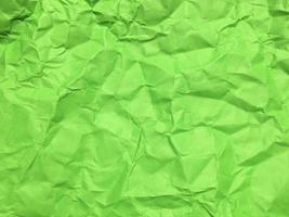 Minimal green crumpled paper texture background for Design. Copy space for text or work photo