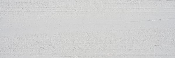 Wide tabletop view of white wood texture background from nature copy space for your designs banner or add text to make work look better. High resolution wooden backdrop for website photo