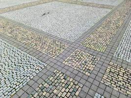 Detailed close up on old historical cobblestone roads and walkways photo