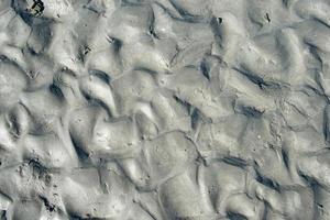 Sandy floor with pattern from waves. France photo