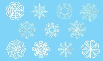 Set of white snowflakes isolated on blue background. Vector illustration