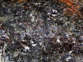 mineral with crystal and metallic inclusions photo