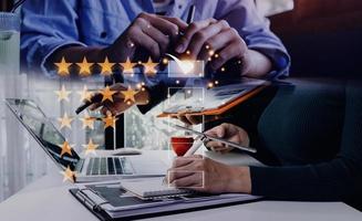 Customer evaluation feedback.men in suit Giving Positive Review for Client's Satisfaction Surveys.giving a five star rating. Service rating, satisfaction concept photo