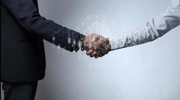 Businessmen shaking hands connecting network links and graph graph of stock market graphic diagram, digital technology, internet communication, teamwork, partnership concept. photo