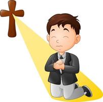 Cartoon little boy kneeling while praying vector