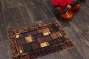 New Delhi, Delhi, IN, 2022 - Yellow Black Cobblestone Welcome Entry Door Mat placed on brown floor with Guitar photo