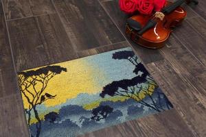 New Delhi, Delhi, IN, 2022 - Modern Black Yellow scenery printed zute doormat with trees placed on brown floor with Guitar photo