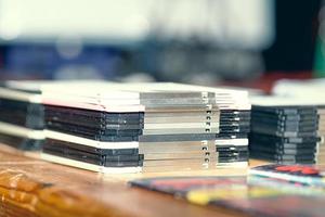 Old stacked floppy disks on the table photo