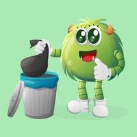 Cute green monster placing reusable waste into garbage can vector