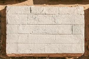 Old brick wall background, brick wall texture, structure. old broken brick, cement joints, close-up. Construction, repair. Concept of devastation, decline. photo