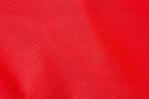 Red sports clothing fabric football shirt jersey texture background photo