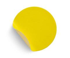 Yellow round paper sticker label isolated on white background photo