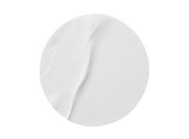 Blank white round paper sticker label isolated on white background photo