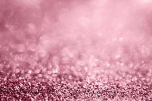 Abstract rose gold glitter sparkle texture with bokeh background photo