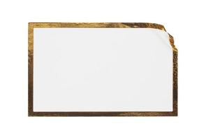 Blank white paper sticker label with golden frame isolated on white background photo