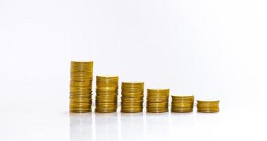 Golden Coins stack arranged as a graph on white background photo