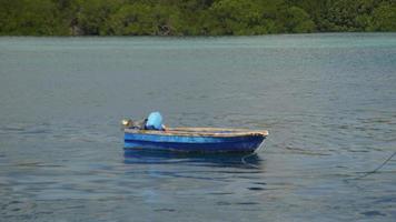 Fisherman boat alone photo