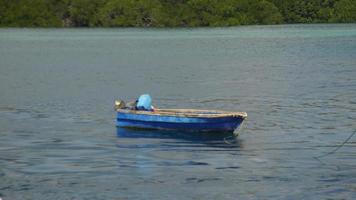 Fisherman boat alone photo