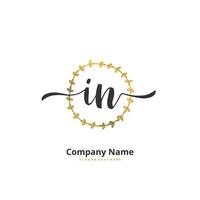 IN Initial handwriting and signature logo design with circle. Beautiful design handwritten logo for fashion, team, wedding, luxury logo. vector