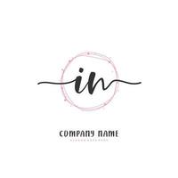 IN Initial handwriting and signature logo design with circle. Beautiful design handwritten logo for fashion, team, wedding, luxury logo. vector